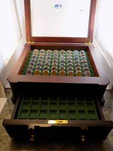 lot 1 image: Wooden Cabinet With Key 50 State Quarters Colorized 6 Gold Plated Quarters Carved On The Sides