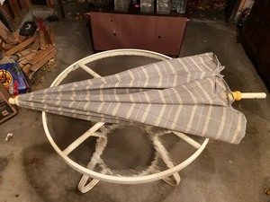 lot 120 image: White Circle Outdoor Glass Table w Umbrella