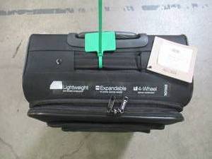 lot 57 image: Kenneth Cole Reaction Going Places 24-Inch Spinner Checked Luggage in Black 2063581