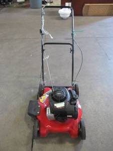 lot 24 image: Yard Machines 20 in. 125cc OHV Briggs & Stratton Gas Push Mower 11A-02BT729