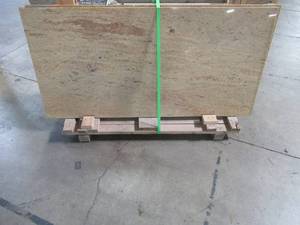 lot 402 image: Stone Source 3cm x 36 x 74 Caramel Cafe STD Granite Island Countertop - Small EdgeCorner Chips