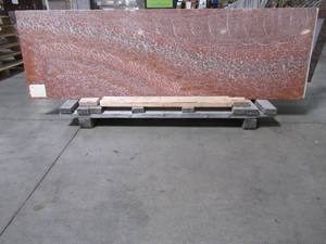 lot 403 image: Stone Source 2cm x 26 x 86 Rojo Onyx Honed Vanity Countertop - Small EdgeCornerSurface Chips.