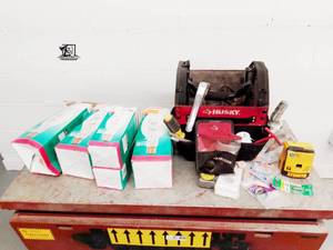 lot 217 image: Husky Tool Bag  with Assorted Tools and Light bulbs