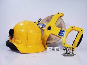 lot 339 image: Yellow Hard hat with ear muffs w Empire FIberglass 300 measuring tape