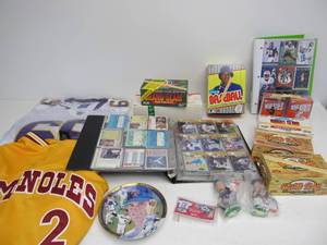 lot 89 image: Group of Sports Memorabilia Cards & Jerseys
