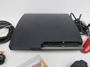 lot 208 image: Nice Clean PLAYSTATION 3 Video Game System wCords & Controllers