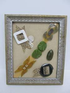 lot 222 image: Vintage 1930s Framed Bakelite Hair clips etc