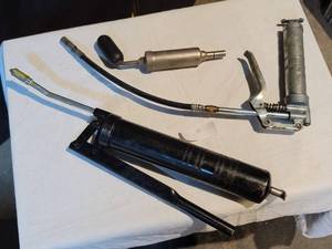 lot 29 image: Set of Three Grease Guns