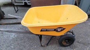 lot 16 image: True Temper Big 8 Cubic Foot Wheelbarrow