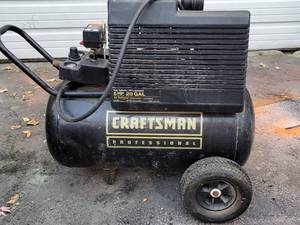 lot 37 image: Craftsman Professional Air Compressor
