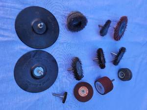lot 77 image: Attachments for a Drill