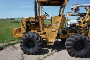 1989 Vermeer Model M495 4 x 4 Rear Mount Cable Plow