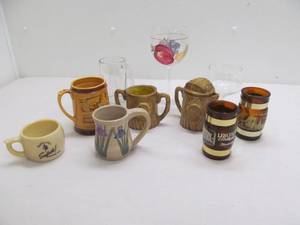 Group of mugs, wine glasses, creamsugar