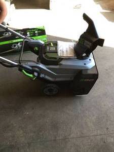 lot 26 image: PALLET WITH EGO SNOW BLOWERTRIMMER SEE PICS