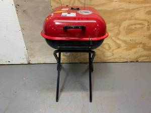 lot 24 image: AMERICANA Walk-A-Bout Portable Charcoal Grill
