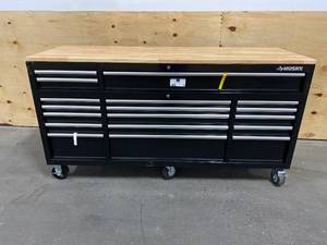 lot 28 image: HUSKY 72 in. 18-Drawer Mobile Workbench with Solid Wood Top, Black