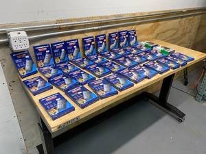lot 65 image: CHAMBERLAIN Lot of 38 Various Garage Door Remotes