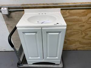 lot 74 image: GLACIER BAY 24 in. W Bath Vanity in White with Cultured Marble Vanity Top in White with White Sink