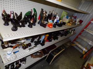 lot 35 image: Huge Lot of Avon Bottles with Vintage Suitcases, Meat grinder and Cassette tapes