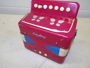 lot 130 image: Vintage Schylling Accordion