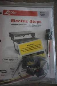 lot 60 image: RV Kwikee Black Electric Steps