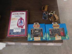 lot 214 image: Hurricane Lantern Picture Frame and Duck Hunting Magnets