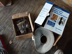 lot 17 image: Almost Full Roll Of Window Flashing Tape & Box Of Concrete Anchors