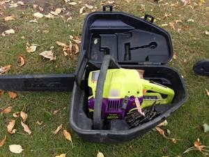 lot 9 image: Poulan Chain Saw With Case