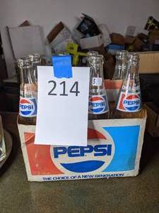 lot 214 image: Eight Vintage Pepsi Bottles in Carrying Case