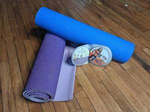 lot 420 image: Two Yoga Mats with Workout DVDs