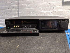 lot 307 image: VHS Player with some VHS