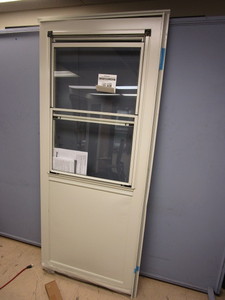 lot 804 image: PRO-VIA STORM DOOR - NEW