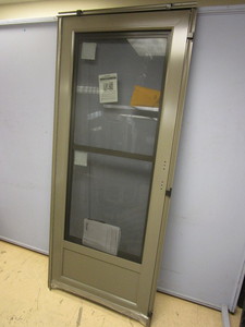lot 811 image: PRO-VIA STORM DOOR - NEW
