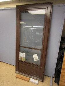 lot 812 image: PRO-VIA STORM DOOR - NEW