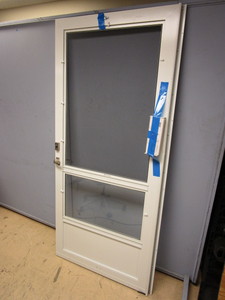 lot 815 image: PRO-VIA STORM DOOR - NEW