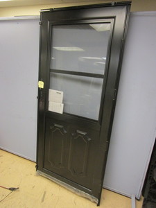 lot 819 image: PRO-VIA STORM DOOR - NEW