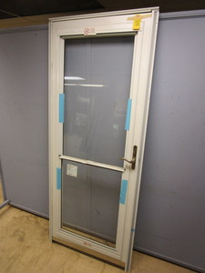 lot 808 image: PRO-VIA STORM DOOR - NEW