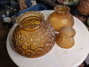 lot 172 image: Trio of Vintage Amber Glass Shades