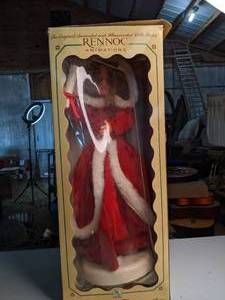 lot 246 image: Rennoc LightedAnimated Christmas Caroler Doll