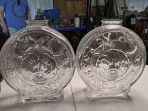 lot 282 image: Mickey & Minnie Clear Glass Piggy Banks