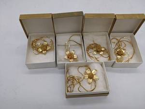 lot 371 image: Five Vintage Gold Tone Flower Necklace