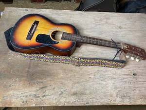 lot 136 image: Vintage Toy Guitar with Colorful Carrying Strap