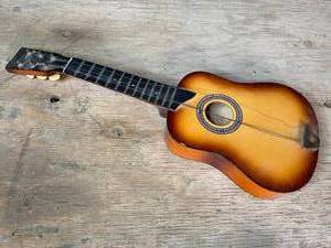 lot 143 image: Vintage Mini Dragon Acoustic Guitar