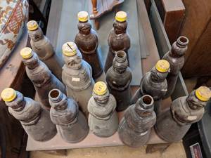 lot 205 image: Multiple Vintage Miss Butterworth Syrup Bottles