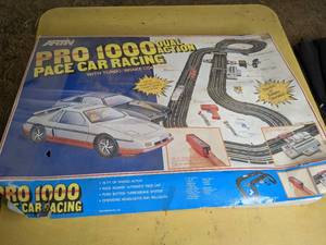 lot 265 image: Vintage Slot Car Racing Track with Assorted Vintage Items