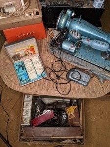 lot 125 image: Three Vintage Sewing Machines and Accessories