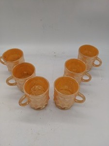 lot 99 image: Set of Six Textured Carnival Glass Mugs