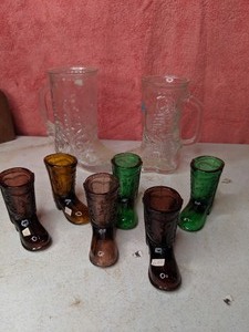 lot 35 image: Eight Assorted Glass Boots
