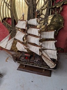 lot 38 image: Model Ship and Metal Ship Decor