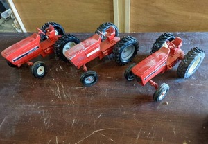 lot 127 image: (3) International Tractors...